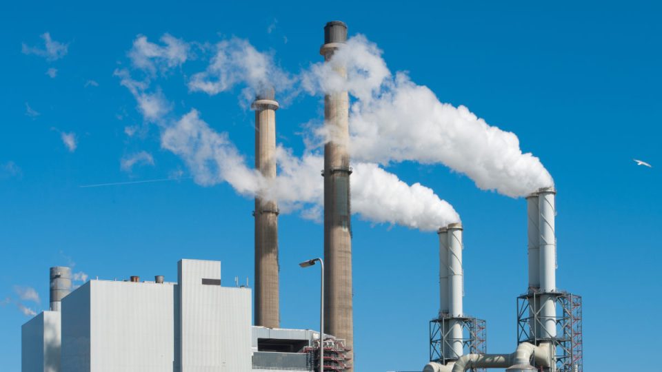 Power,Plant,With,Smoking,Chimneys,In,Rotterdam,,Netherlands power plant with smoking chimneys in Rotterdam, Netherlands